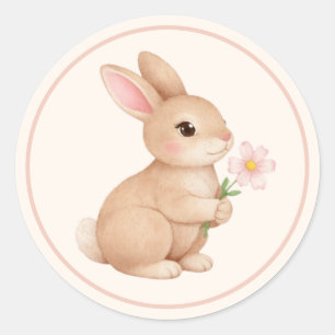 Babykanin med rosa blomma runt klistermärke