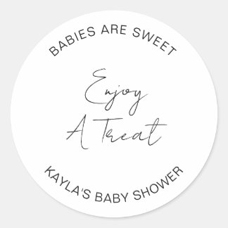 Babys är söta njut en godis som firar bebis    runt klistermärke