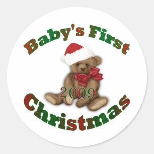 Babys första jul runt klistermärke