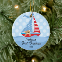 Baby's första jul segelbåt foto