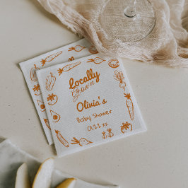 Babyskor för lokalt odlade grönsaker i hand plocka pappersservett