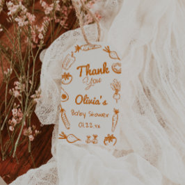 Babyskor för lokalt odlade grönsaker i hand plocka presentetikett