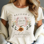 Bach Crew Western Blommigt Horseshoe Bachelorette T Shirt<br><div class="desc">Gå in i stil med vår häpnadsväckande "Bach Crew" cowgirl blommigt horseshoe western Bachelorette Party tri blend-skjorta! Den här skjortan är designad för den moderna bruden som firar sin unika själ. Perfekt för en Western Bachelorette, för att visa kärlek för all sak Western, tillför den här skjortan en bit konstnärlighet...</div>