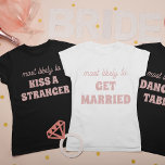 Bachelorette Party Most Likely To Dance On Tables T Shirt<br><div class="desc">This funny personalized bachelorette party "Most likely to dance on tables" t-shirt is the perfect way to celebrate the bride-to-be! The playful script and modern font create a trendy look, while the spacious back design provides plenty of room for additional personalization or group names. Whether you're hitting the town or...</div>