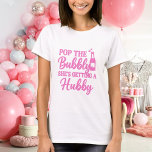 Bachelorette party pink pop the bubbly t shirt<br><div class="desc">Text: Pop the Bubbly,  She's getting a Hubby.  Pink text.</div>