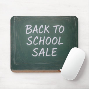 Back to school-signera på en Grönt-kalkylpanel Musmatta