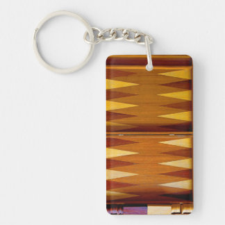Backgammon stiger ombord nyckelringen