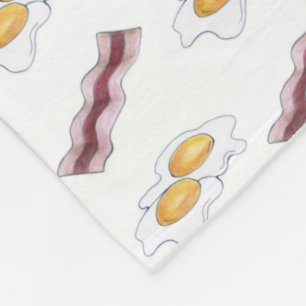 Baconremsor och torkade ägg Frufast Food Pairing Fleecefilt