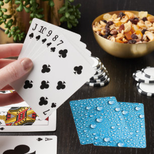 Bädda droppar i Vatten på havsblått Casinokort