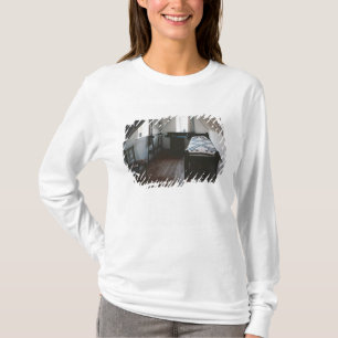 Bädda ned handdukstången som är designad vid de t-shirt