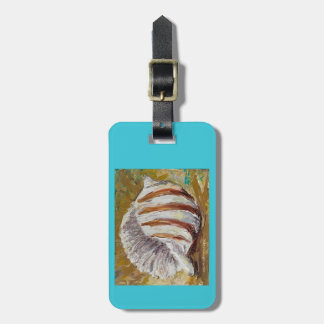 Bagagemärkre med conchsnäckan bagagebricka