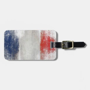 Bagagemärkren med extra smutsar ner flagga från bagagebricka