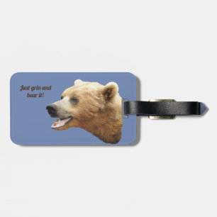 Bagagetapp med läderband av grizzlybjörn bagagebricka