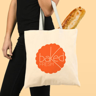 Bagersäck av färsk skivad logotyp av orange tygkasse