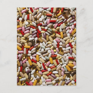 Bakgrund av färgstarka multivitamintabletter. vykort