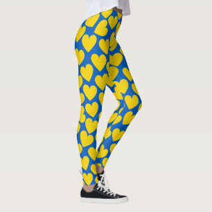 Bakgrund för gultens blå hjärtan leggings