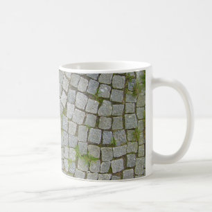 Bakgrund för kullerstenvägstruktur kaffemugg