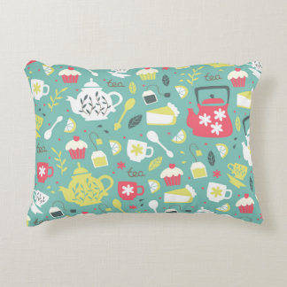 Bakgrund med Tekanna, Kopp, citron, blommor a Prydnadskudde