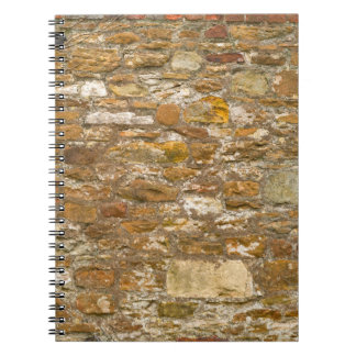 Bakgrund och struktur stenvägg. Hög upplösning Anteckningsbok
