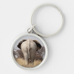 Bakre vy av elefant rund silverfärgad nyckelring