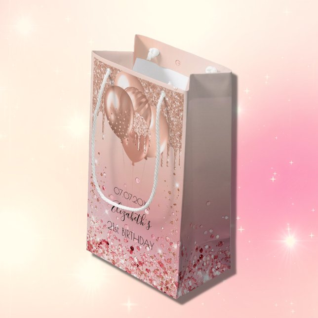 Ballonstrumpor från rosa ros guld under födelsedag (Skapare uppladdad)