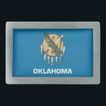 Bälte Buckle med Flagga i Oklahoma-staten<br><div class="desc">Tillsätt en pulserande beröring av Oklahoma-andan till din attityd med exklusivens bälte-låsbeslag som innehåller Oklahomas flagga! Den här låsbeslaget i bälte är mer än bara funktionellt, den är ett firande av Oklahoma-arvet och statsken. Den djärva utformningen visar stolt det ikoniska inslagen i Oklahoma-flagga, som symboliserar statens rik, enighet och fasta...</div>