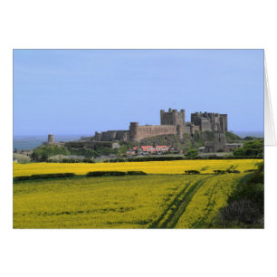 Bamburgh slott - Northumberland med kust- baksida Hälsningskort
