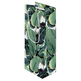 Bananen lämnar palmträdet den tropiska vingåvan