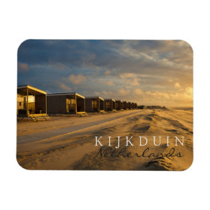 Bandskåp vid solnedgången vid kusten magnet