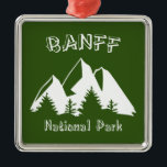 Banff nationalpark julgransprydnad metall<br><div class="desc">Med platser som Sjö Louise och Moraine Bow Banff nationalpark i Alberta är Kanadas äldsta nationalpark och grundades 1885.</div>