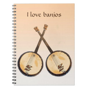 Banjomusik instrumenterar den orange anteckningsbok