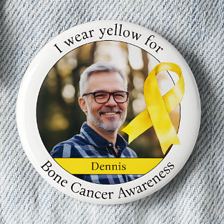 Bär gult för medvetenhet om bencancer knapp