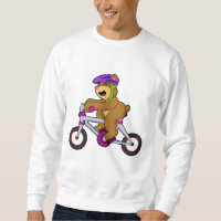 Bär med cykel och hjälm