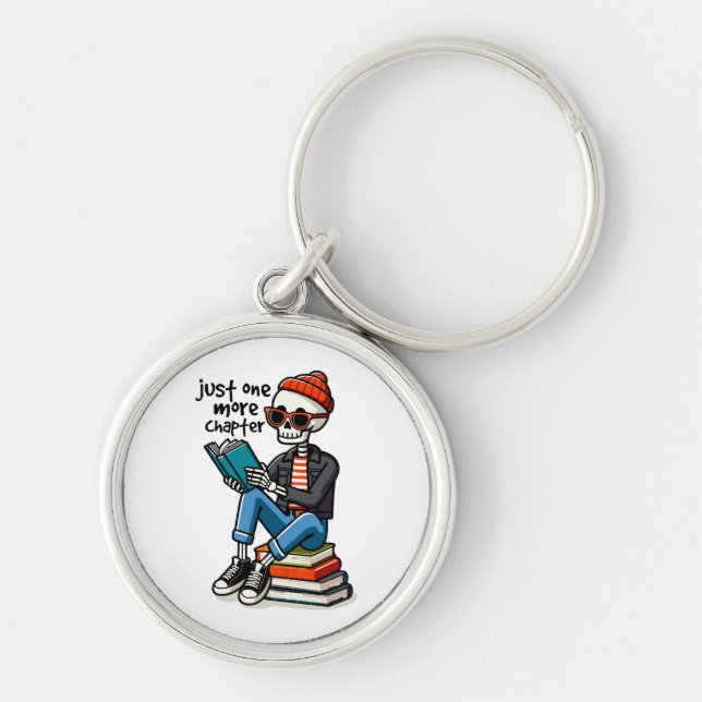 Bara ett kapitel till rund silverfärgad nyckelring (Framsidan)