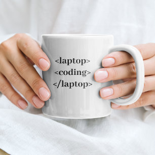 Bärbar dator med fin kodning kaffemugg