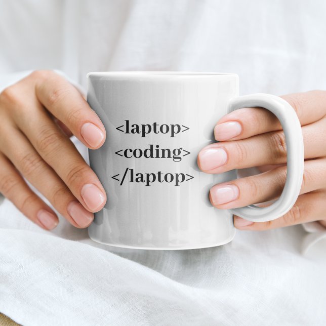 Bärbar dator med fin kodning kaffemugg (Skapare uppladdad)