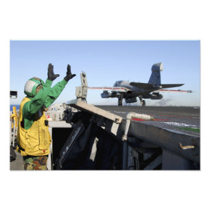 Barkasser för en EA--6Bperson som stryker omkring Fototryck