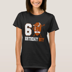 Barn 6 år gammal dabbboll i 6e t shirt