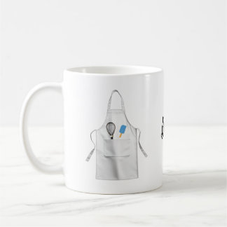 Barn i magen kaffemugg