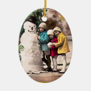 BARN MED SNÖGUBBE JULGRANSPRYDNAD KERAMIK