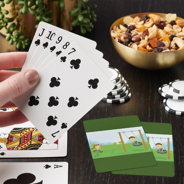 Barn som leker på bildäckssvinga casinokort (Skapare uppladdad)