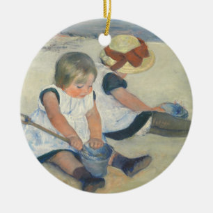 Barn som leker på stranden, 1884 julgransprydnad keramik
