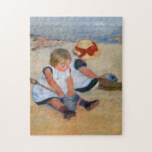 Barn som spelar på stranden pussel
