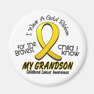 Barndomcancer ha på sig jag det guld- bandet för magnet