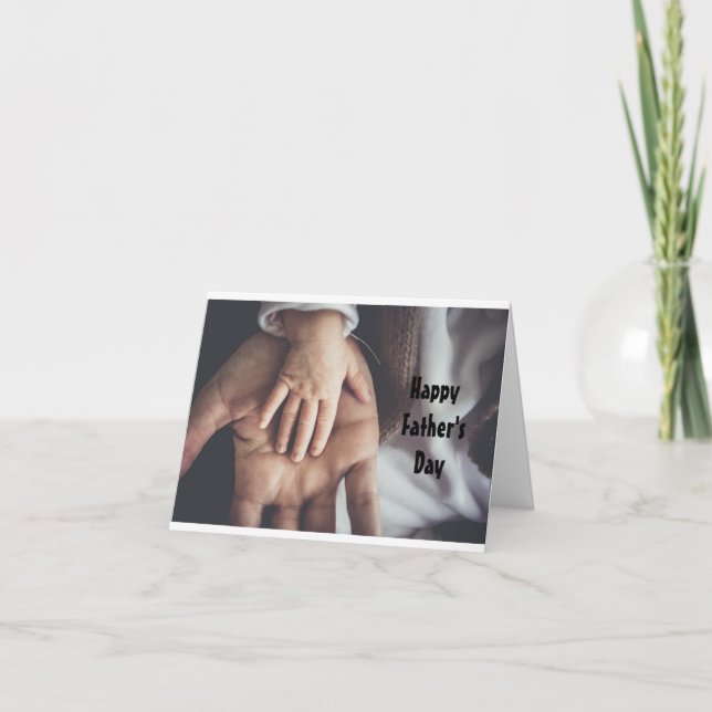 Barnets hand med faderns hand-kort kort (Framsida)