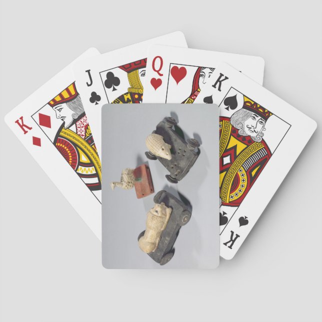 Barns leksaker: en häckare, en lejon och en duva,  spelkort (Baksidan)