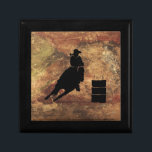Barrel Tävla Girl Silhouette på Grunge Struktur Smyckeskrin<br><div class="desc">Matematisk illustration av spännande och rätlinjiga rodeo. Silhouette av en cowgirl-tävla med sin häst. Bakgrunden är en grov,  vättad brun och röd tonad jordrik grunge struktur. Underbar för rodeoentusiaster och hästälskare.</div>