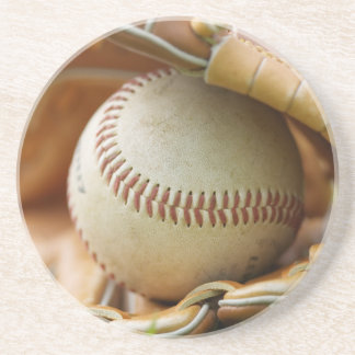 Baseballhandske och boll underlägg sandsten