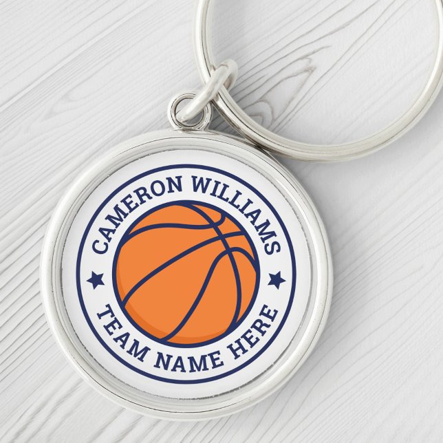 Basketball namn och teamblå stjärnor vita rund silverfärgad nyckelring (Skapare uppladdad)