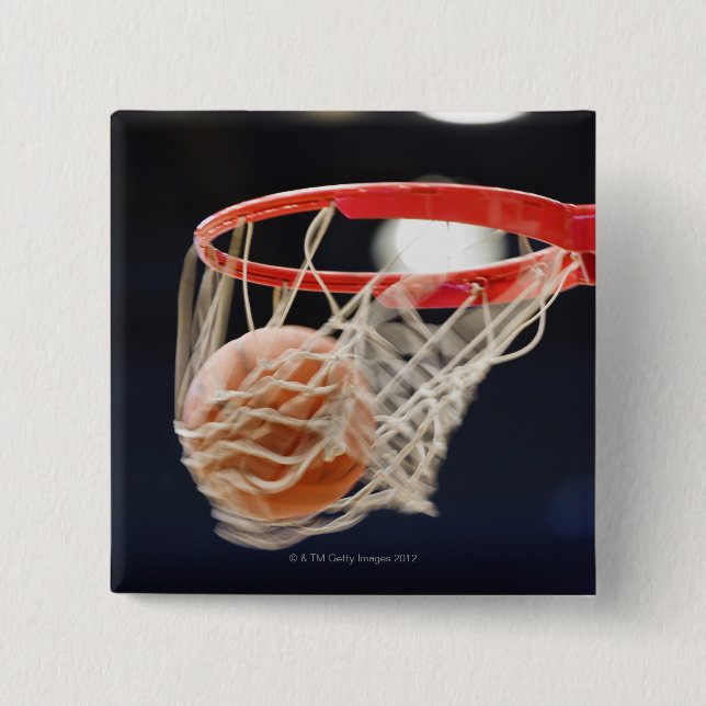 Basketboll i basket. knapp (Framsida)